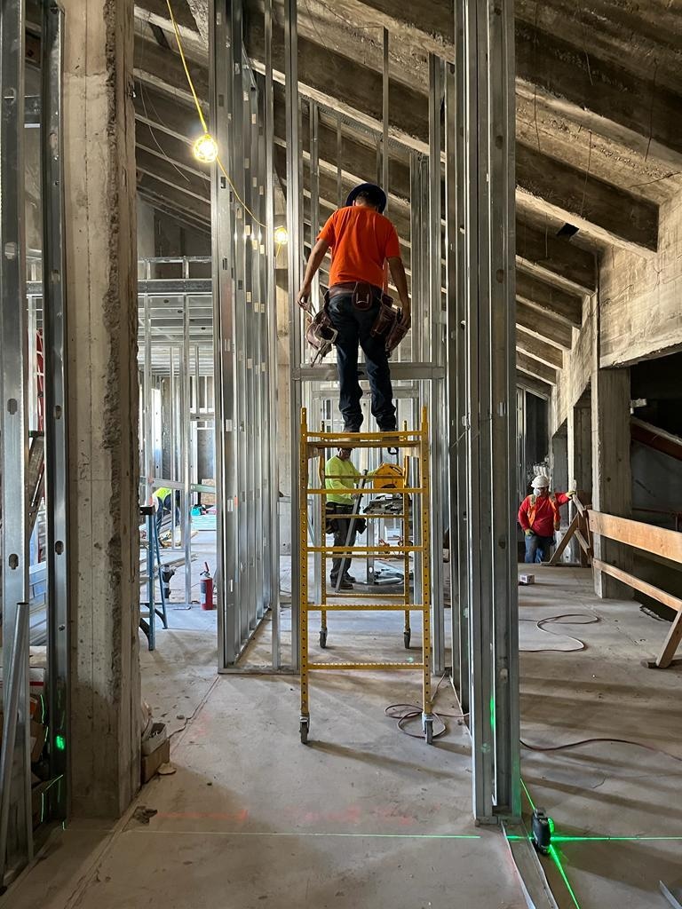 DWD Builders crew installing commercial interior metal stud framing