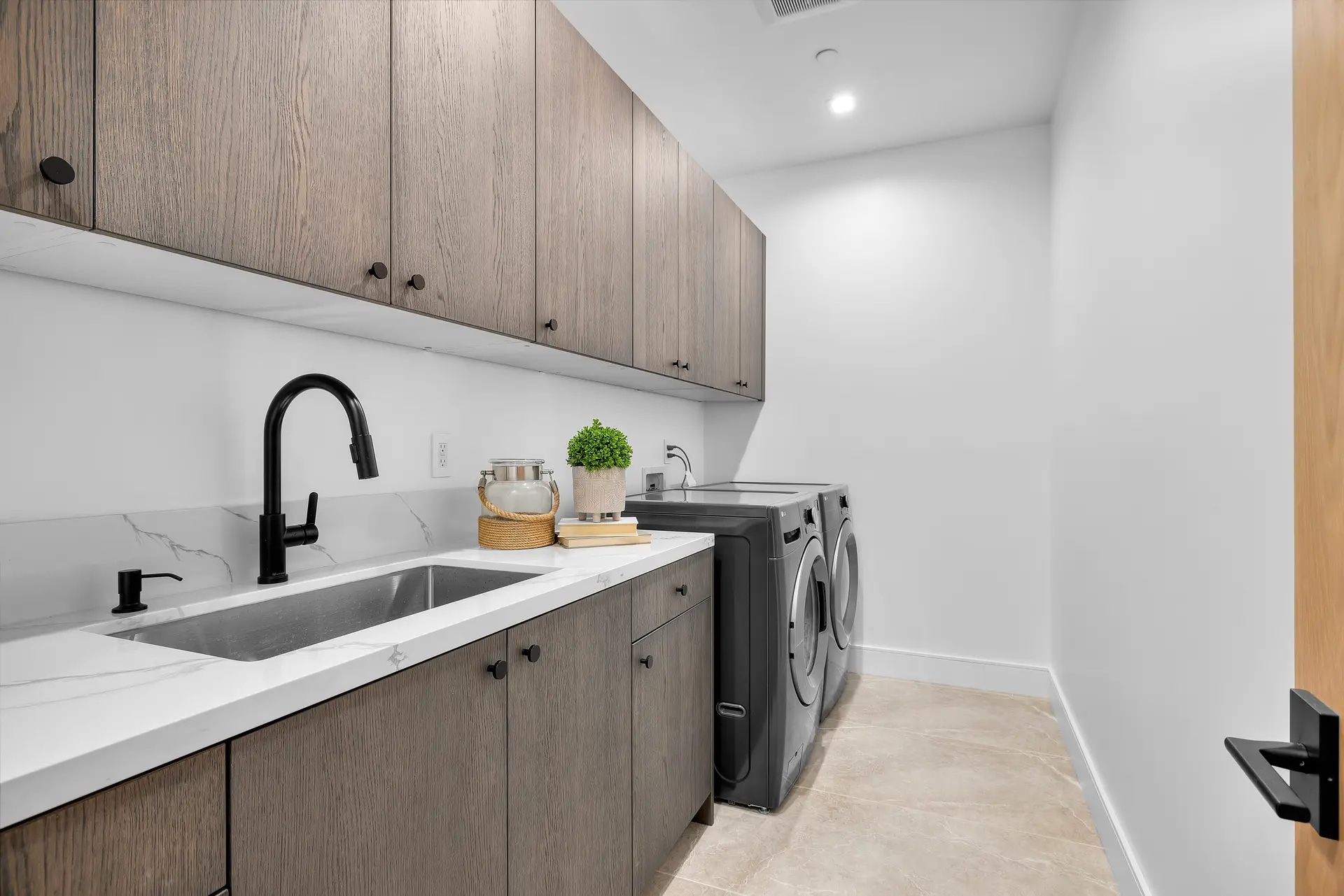 Luxury laundry room in a DWD Builders home in Encino, California