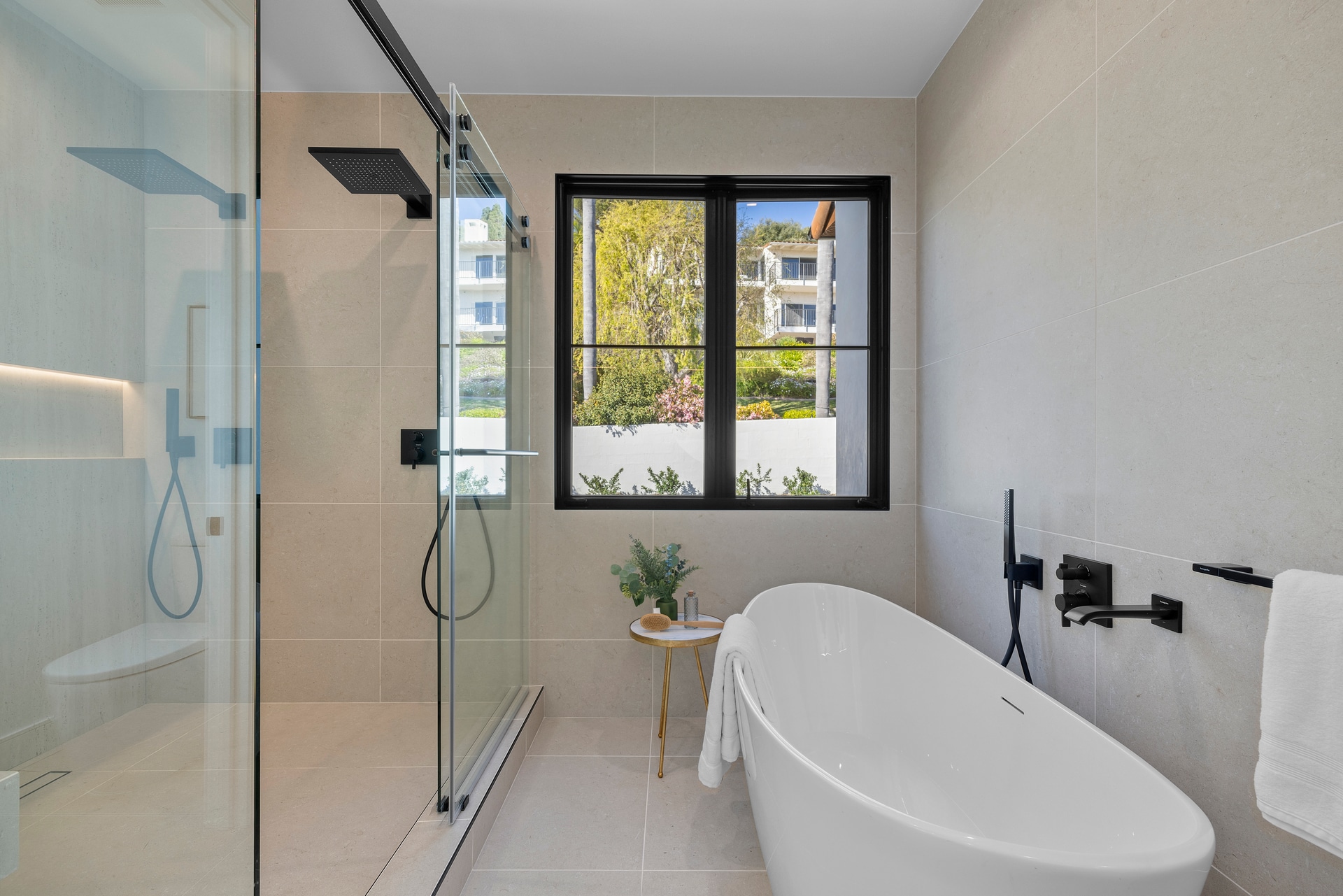Completed spa bathroom with freestanding tub in a DWD Builders luxury estate in Palos Verdes, California