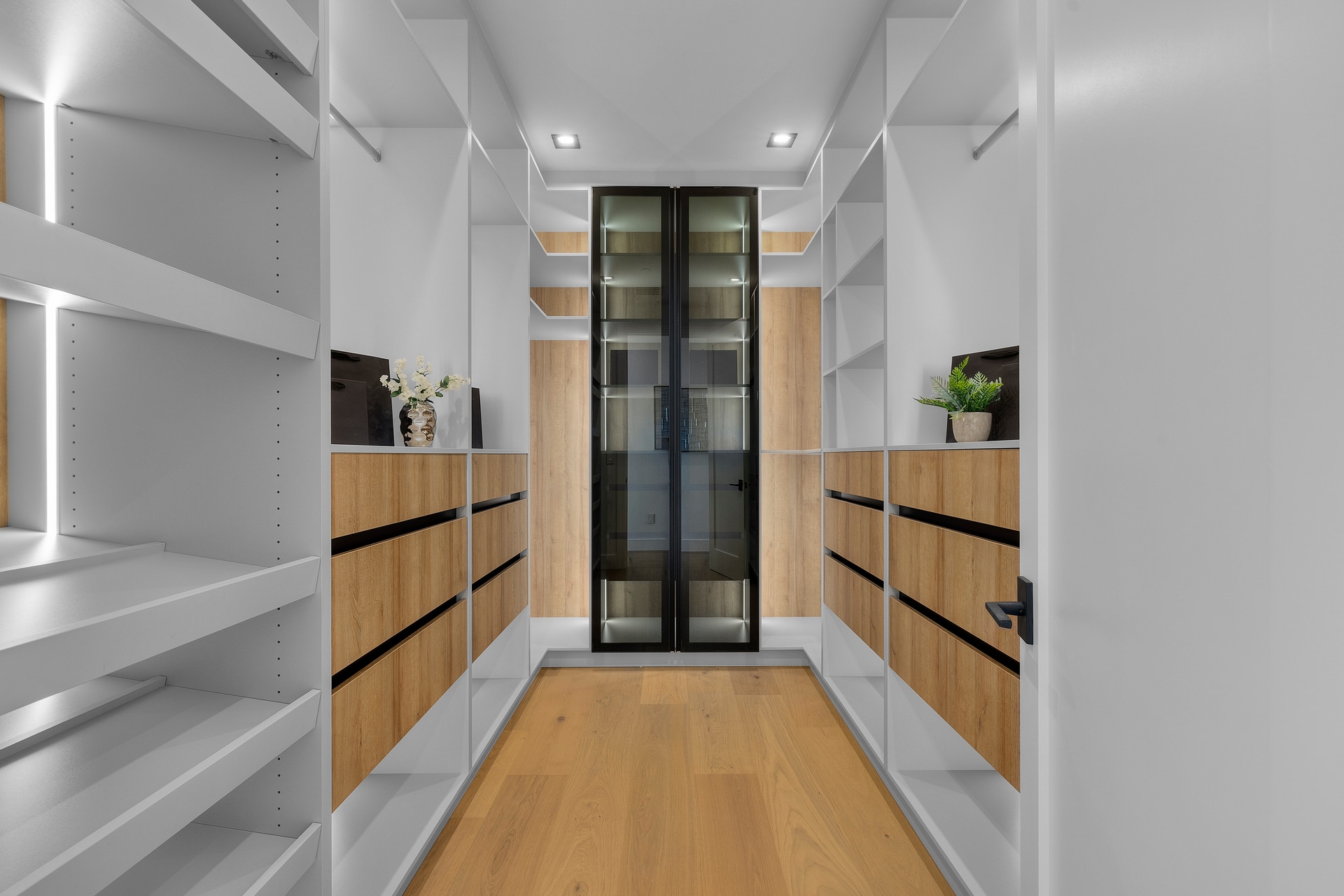 Completed custom dressing room with built-in cabinetry in a DWD Builders luxury estate in Palos Verdes, California
