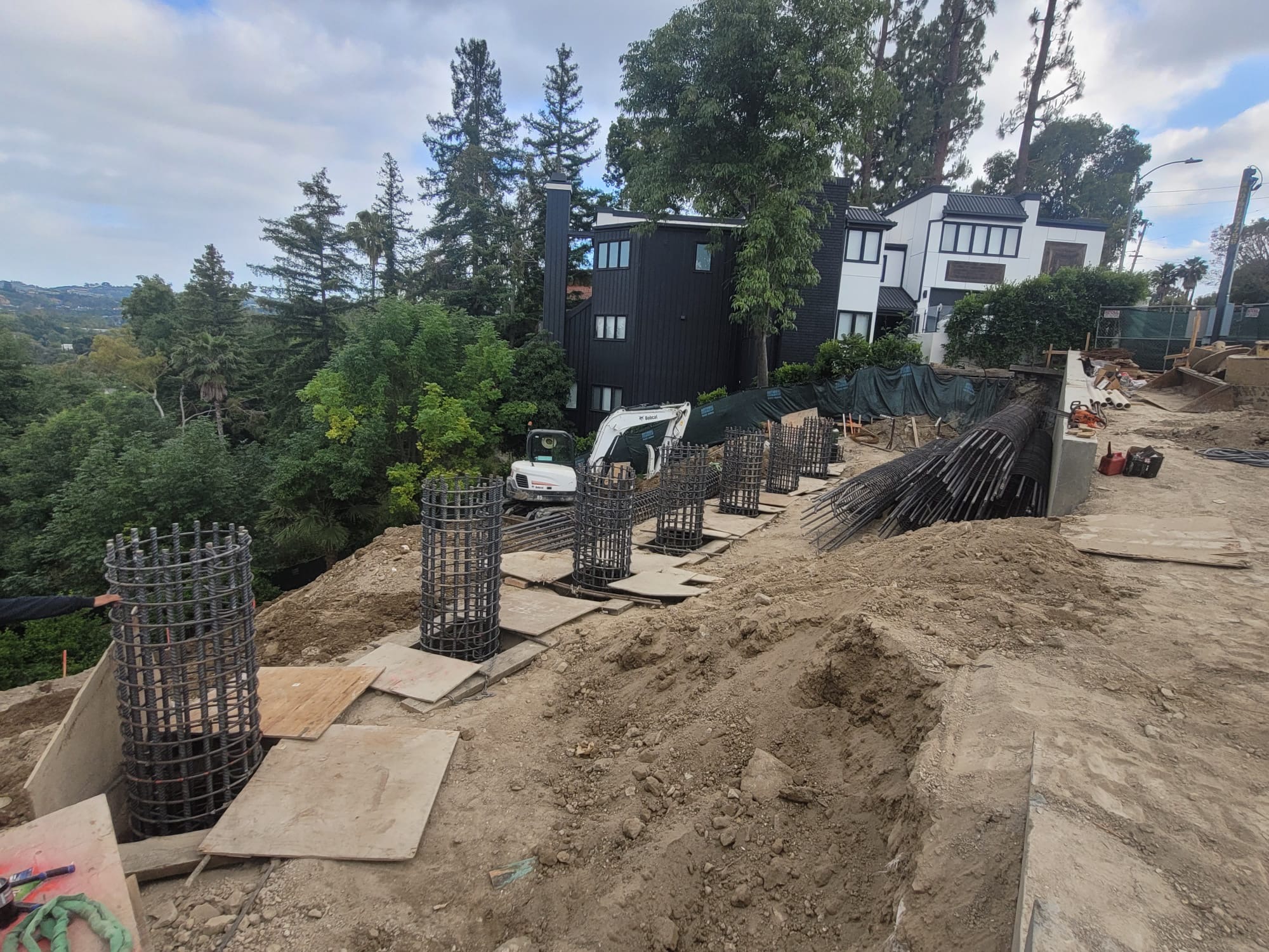 Active caisson foundation site — DWD Builders Encino 2026