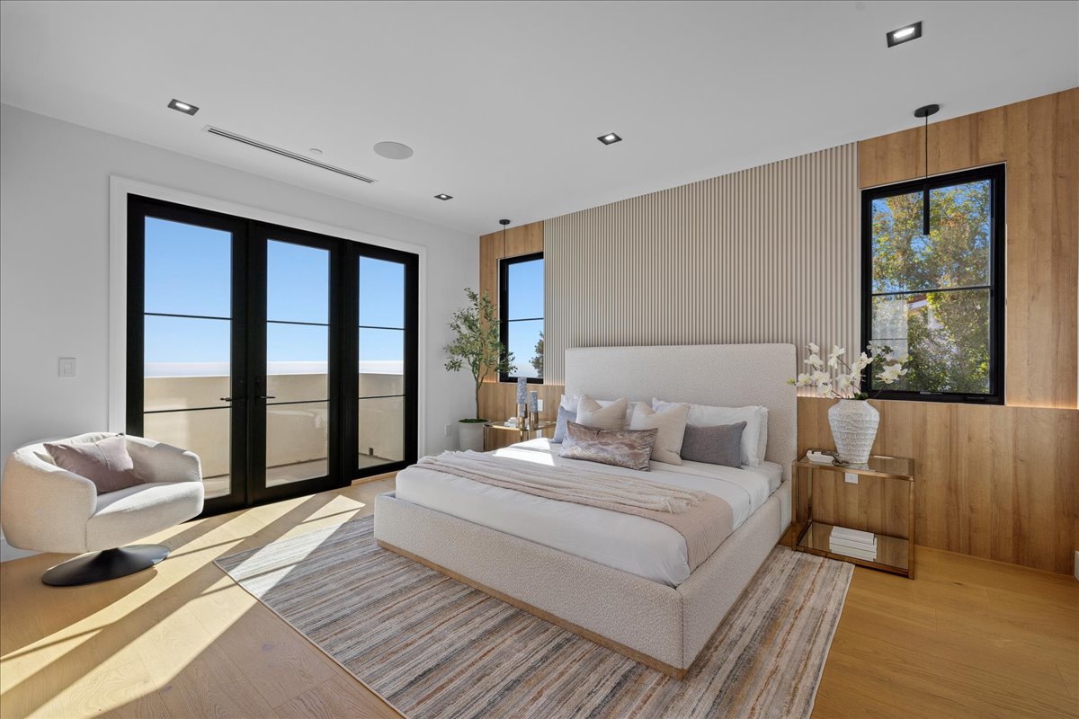 Primary Bedroom — Balcony Access