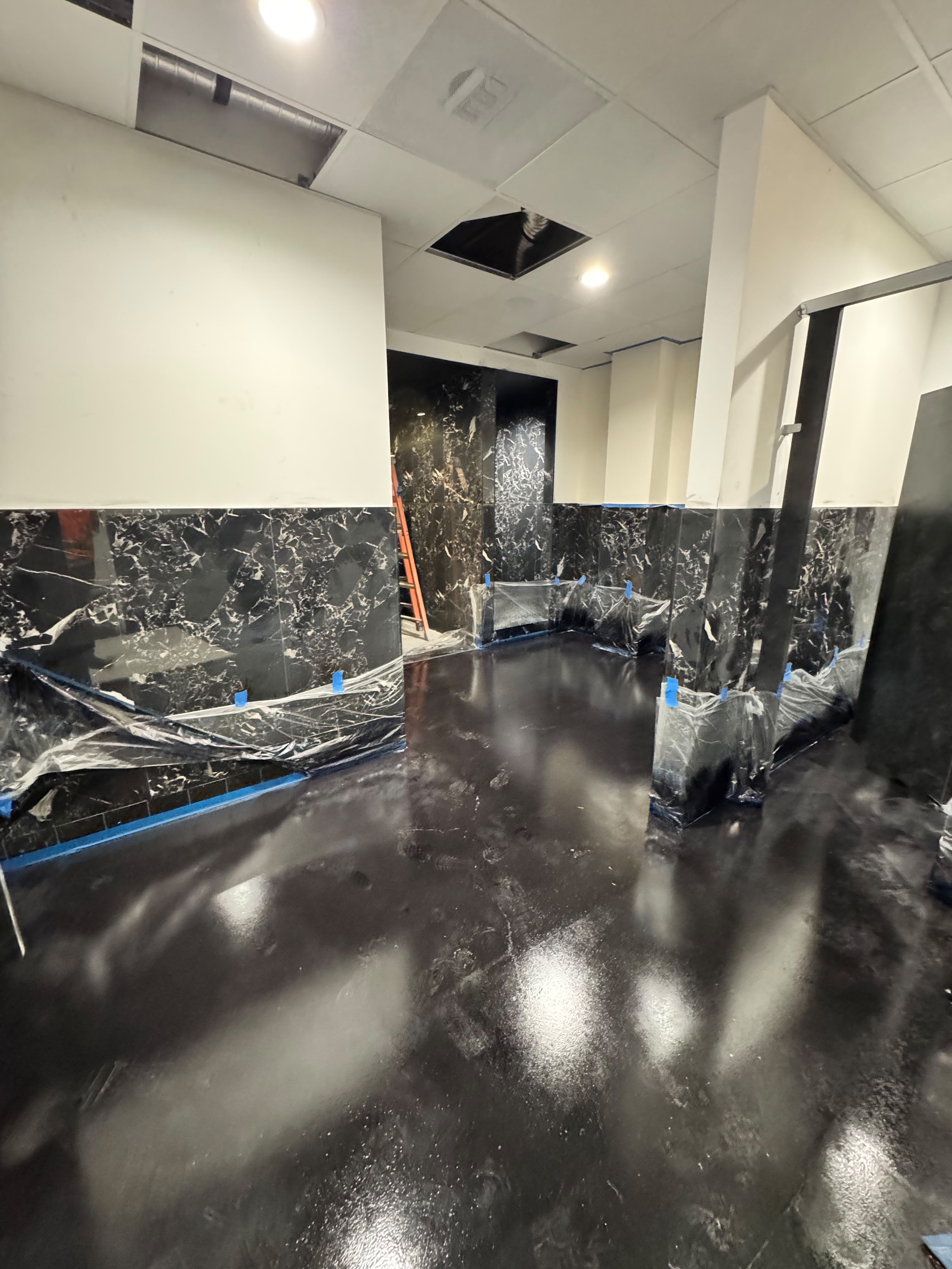 Locker Room — Black Marble Tile Wainscot & Epoxy Floor