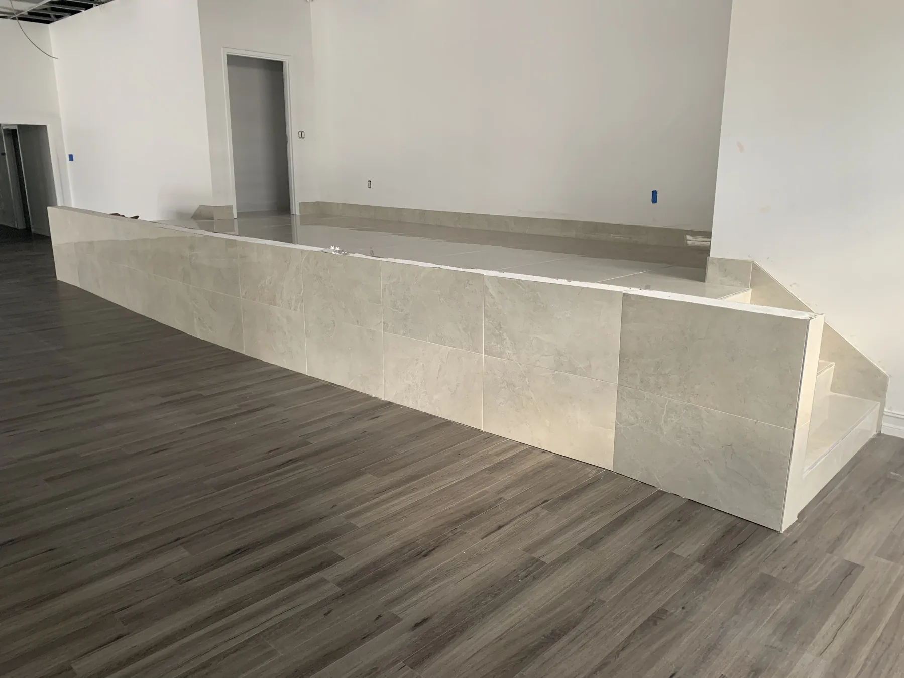 Finish Phase — Front Desk Stone Finish