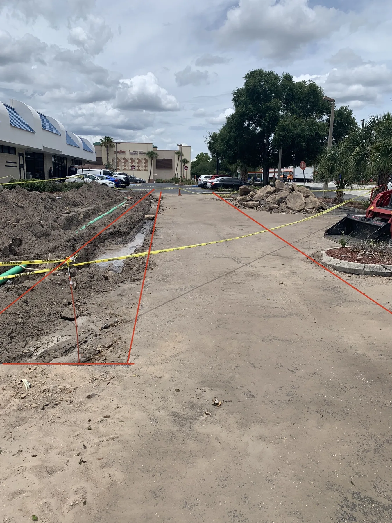 Site Utilities — Water and Sewer Route Across Parking Area
